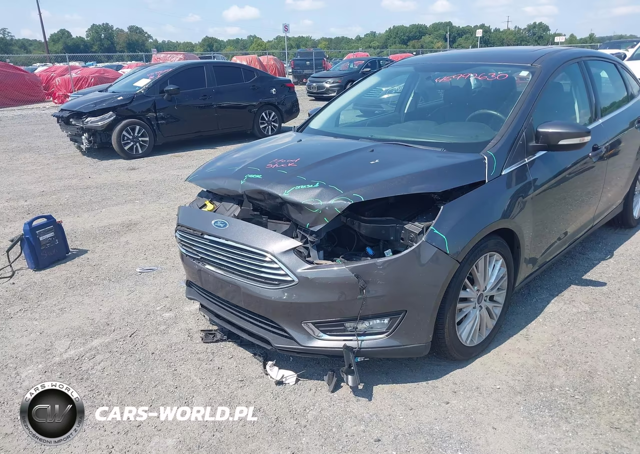 2017 Ford Focus Titanium VIN:1FADP3J29HL282475 - 6