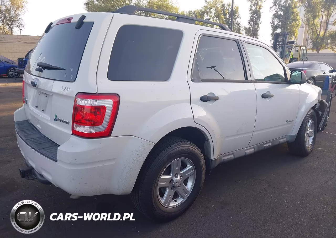 2011 Ford Escape Hybrid VIN:1FMCU4K37BKC63704 - 4