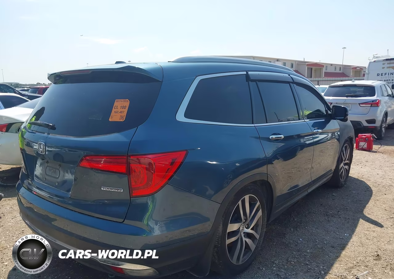 2017 Honda Pilot Touring VIN:5FNYF5H97HB020230 - 4