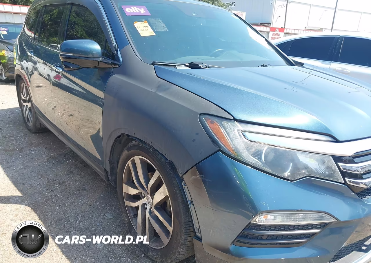 2017 Honda Pilot Touring VIN:5FNYF5H97HB020230 - 6