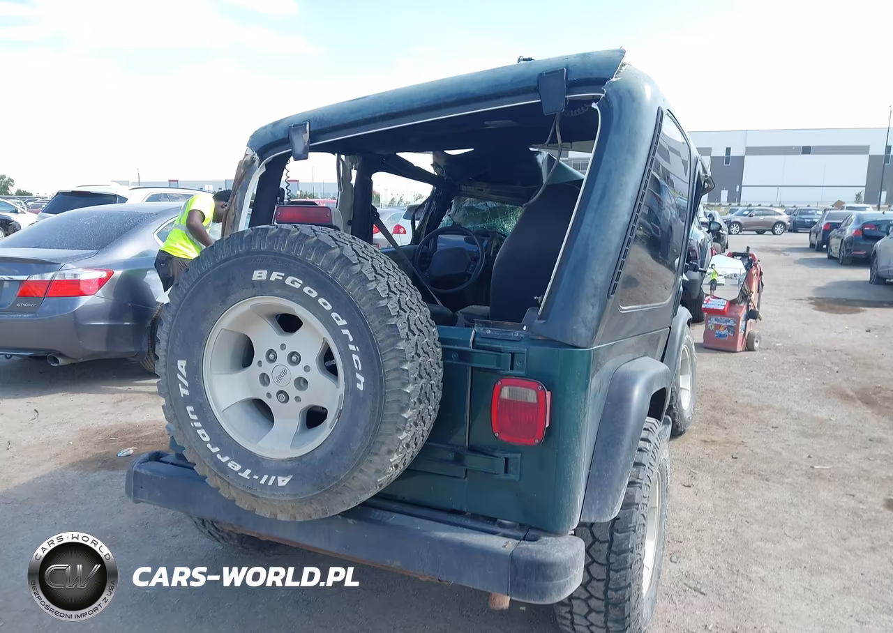 1999 Jeep Wrangler Sport VIN:1J4FY19S0XP456198 - 4