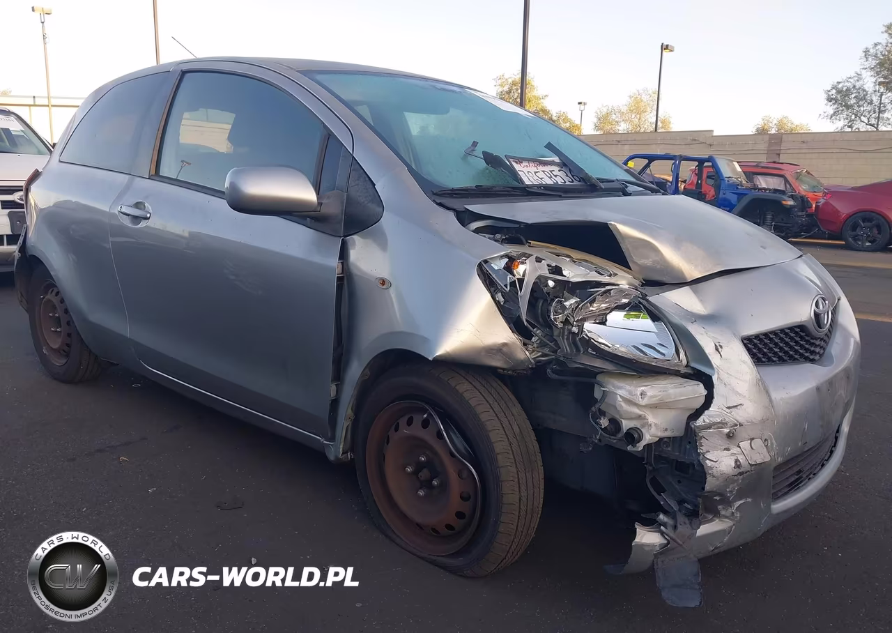 2009 Toyota Yaris VIN:JTDJT903395227600 - 1