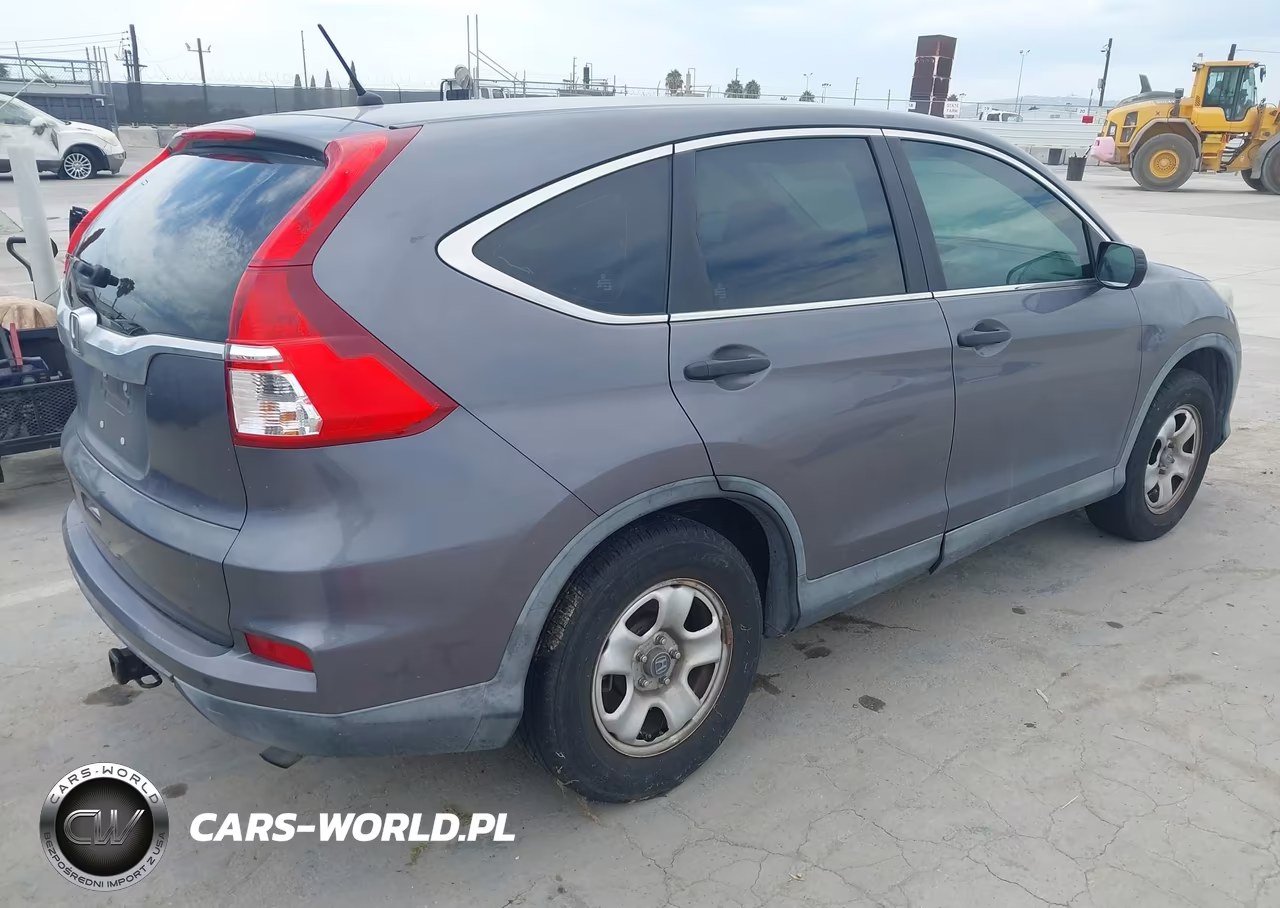2015 Honda Cr-V Lx VIN:5J6RM3H33FL000989 - 4
