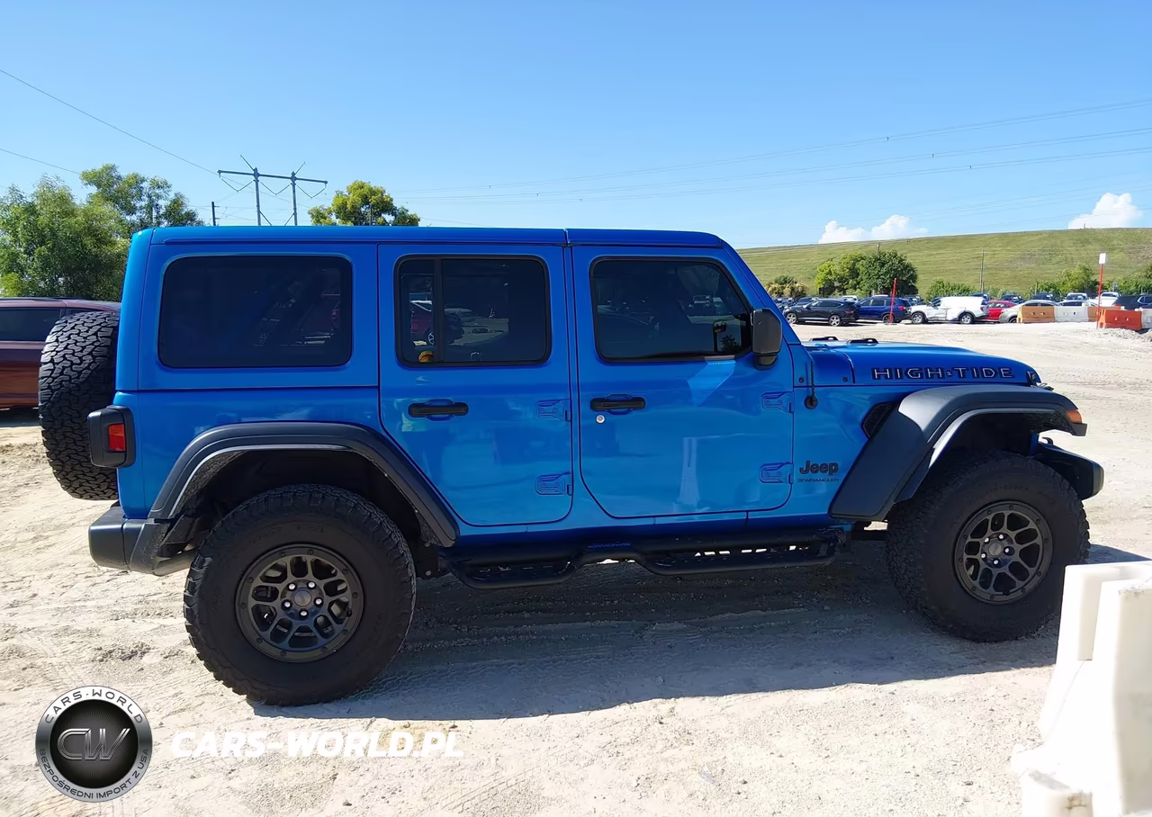 2023 Jeep Wrangler 4-Door High Tide 4X4 VIN:1C4HJXDG6PW673219 - 13