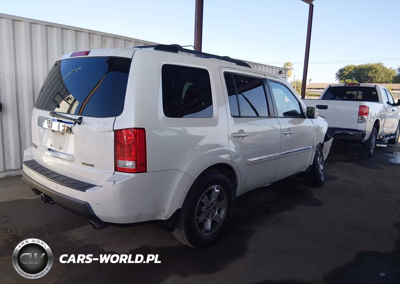 2011 Honda Pilot Touring VIN:5FNYF3H98BB057119 - 4