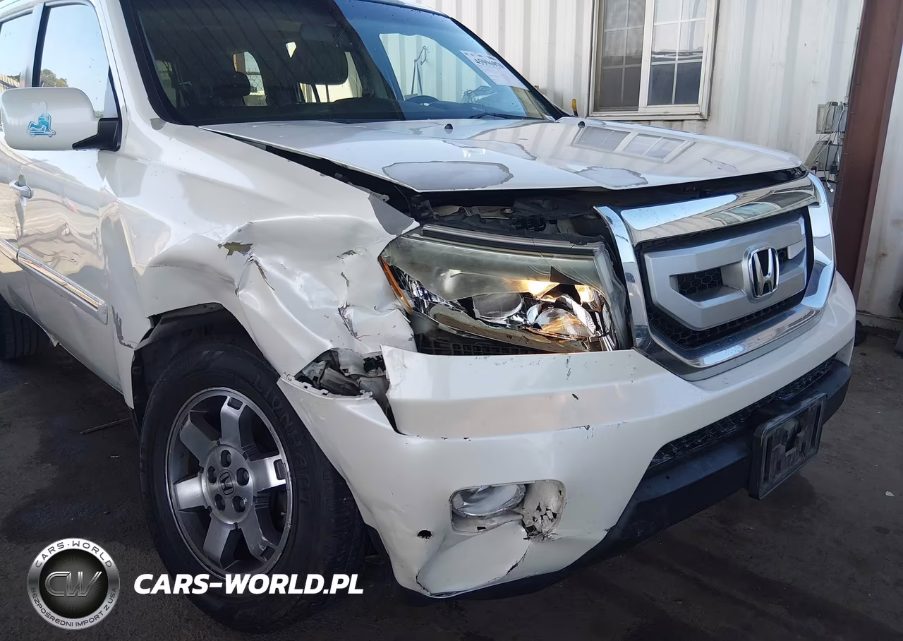 2011 Honda Pilot Touring VIN:5FNYF3H98BB057119 - 6
