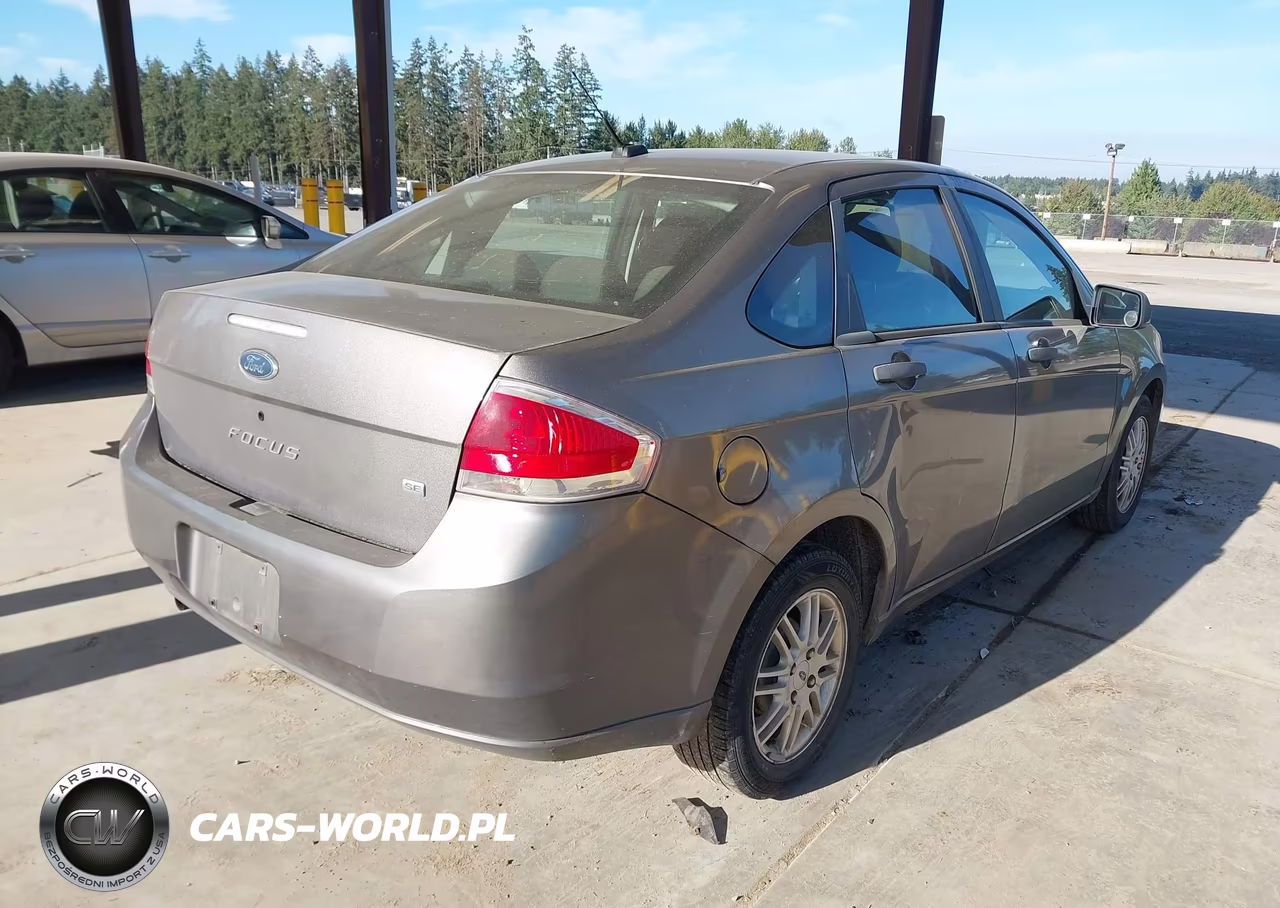 2009 Ford Focus Se VIN:1FAHP35N49W140329 - 4