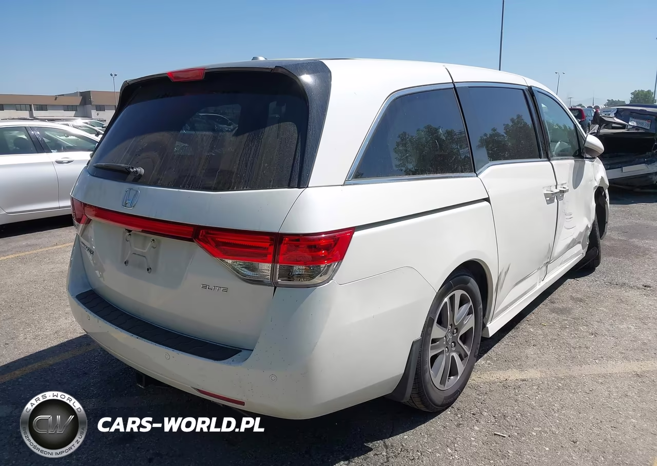 2014 Honda Odyssey Touring-Touring Elite VIN:5FNRL5H93EB112704 - 4