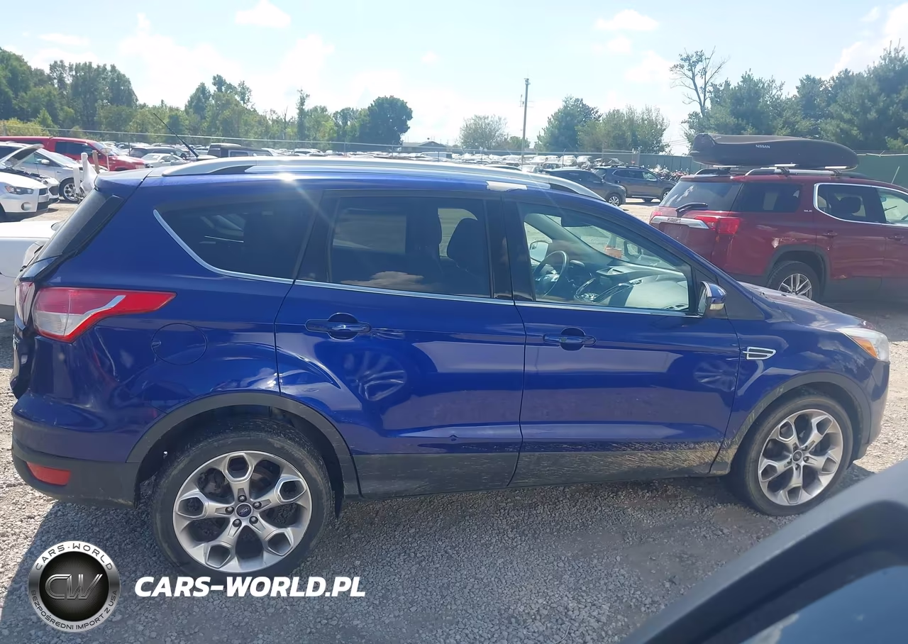 2016 Ford Escape Titanium VIN:1FMCU0J94GUA74244 - 13