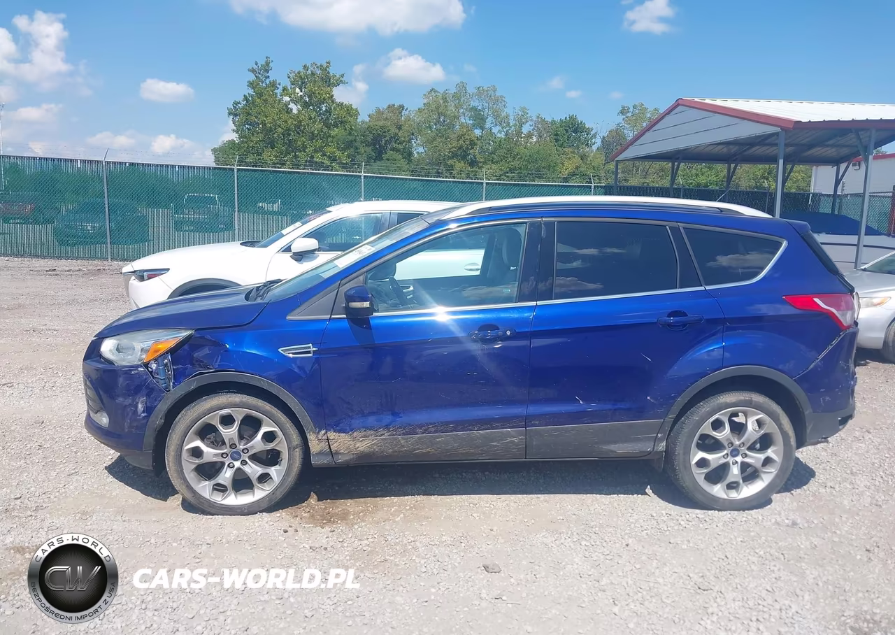 2016 Ford Escape Titanium VIN:1FMCU0J94GUA74244 - 14