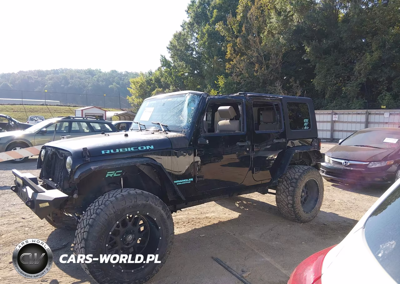 2010 Jeep Wrangler Unlimited Rubicon VIN:1J4BA6H16AL128937 - 14