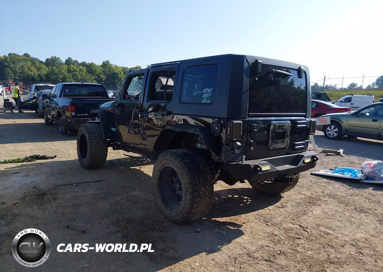 2010 Jeep Wrangler Unlimited Rubicon VIN:1J4BA6H16AL128937 - 3