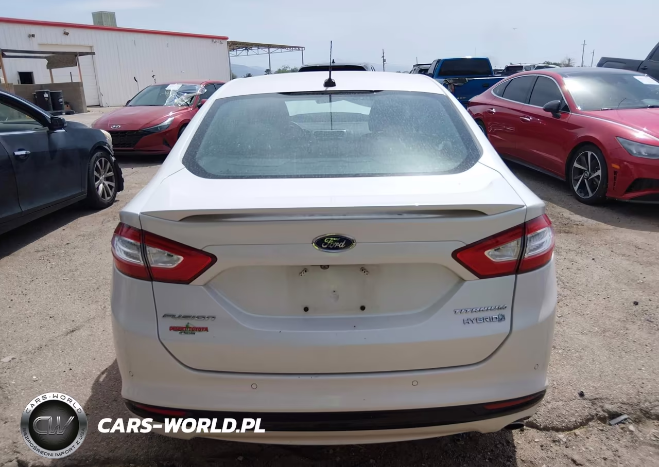2016 Ford Fusion Hybrid Titanium VIN:3FA6P0RU8GR115425 - 17