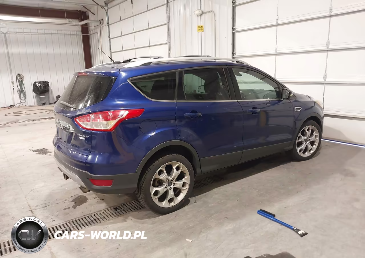 2015 Ford Escape Titanium VIN:1FMCU9J96FUA31446 - 4