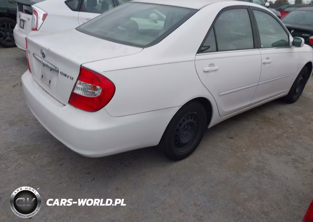 2002 Toyota Camry Le VIN:JTDBE30K420102854 - 4