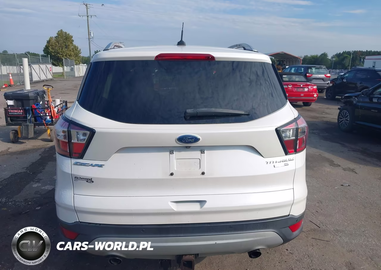 2017 Ford Escape Titanium VIN:1FMCU9J98HUD82121 - 16