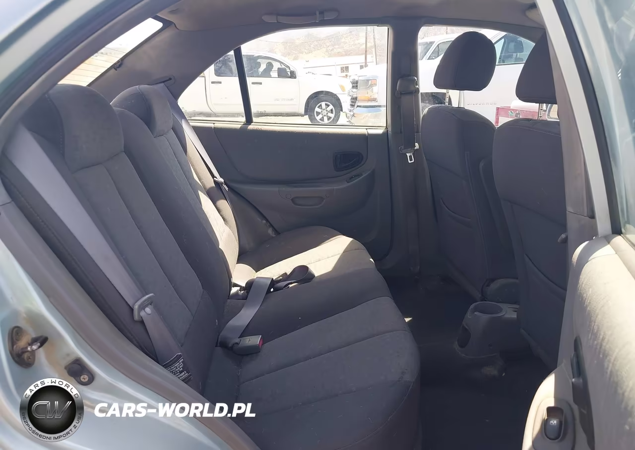 2005 Hyundai Accent Gls VIN:KMHCG45CX5U635886 - 8