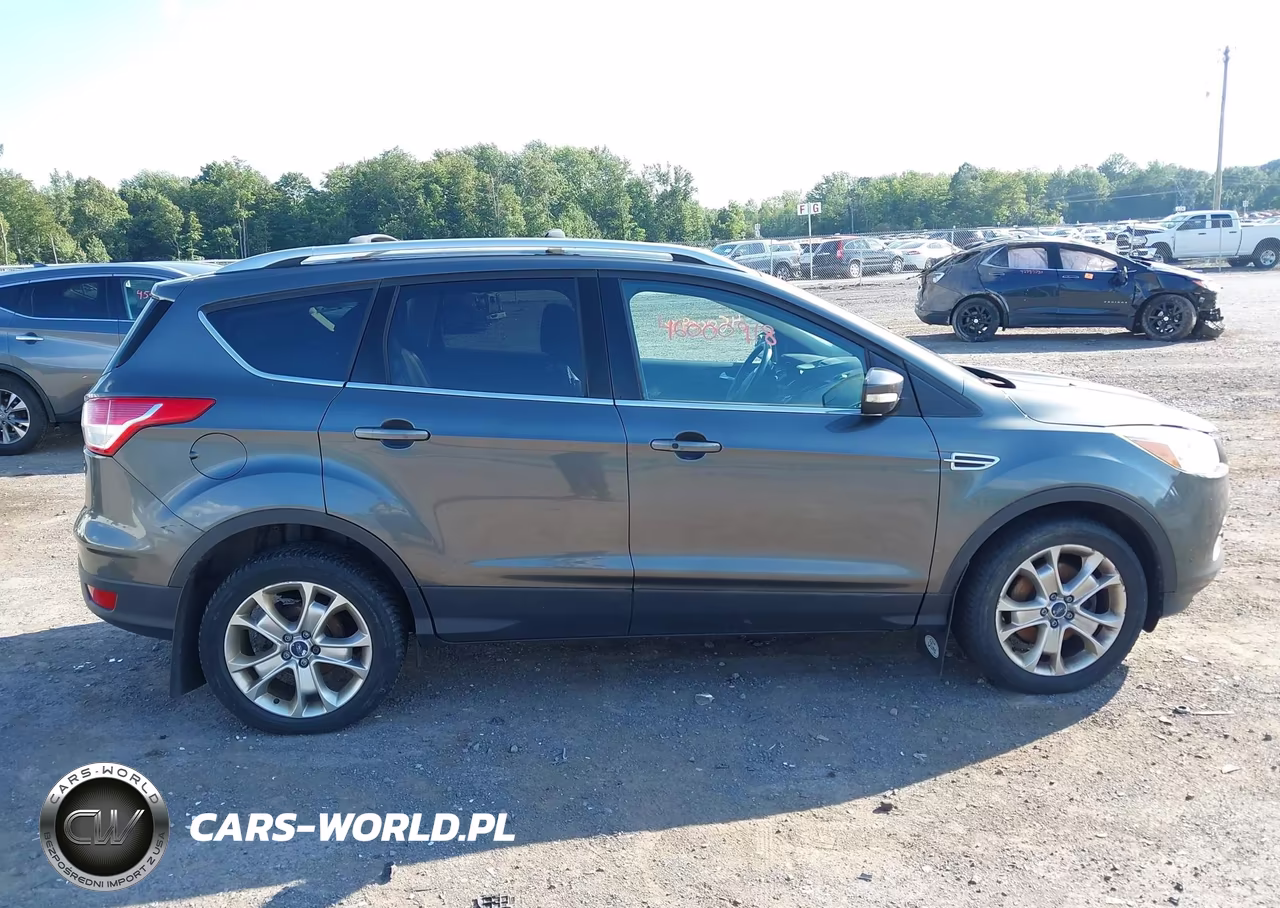 2016 Ford Escape Titanium VIN:1FMCU9JX1GUC48001 - 13