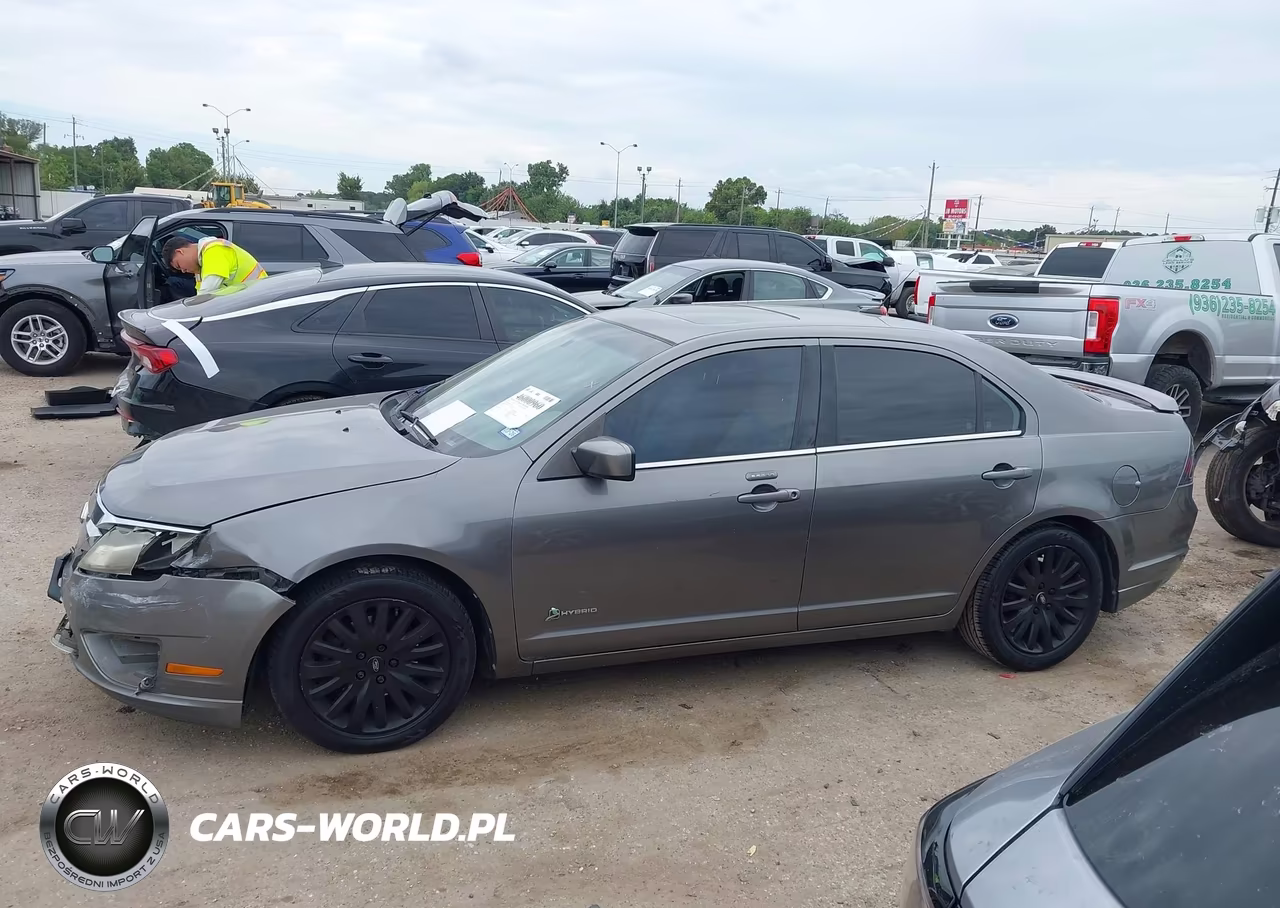 2010 Ford Fusion Hybrid VIN:3FADP0L35AR112545 - 14