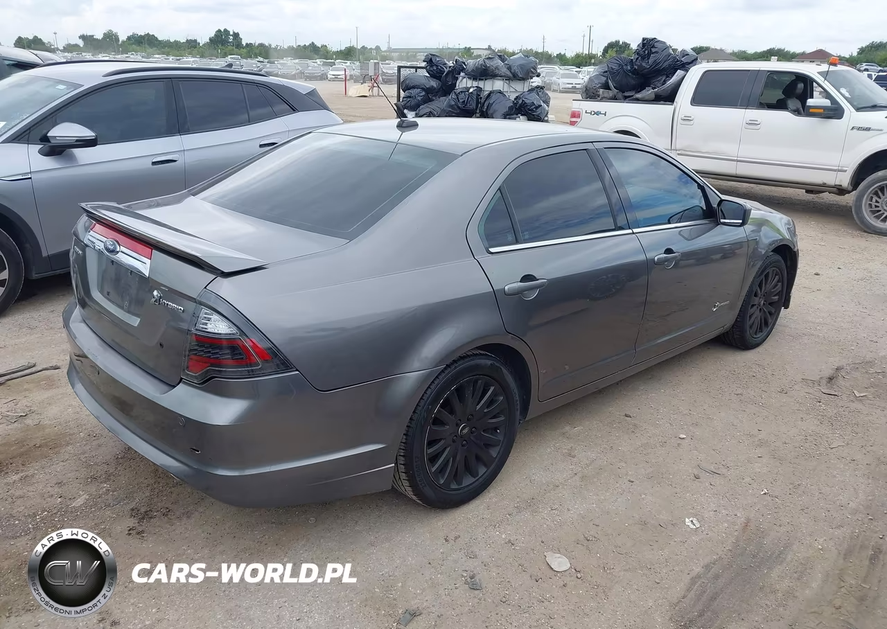 2010 Ford Fusion Hybrid VIN:3FADP0L35AR112545 - 4