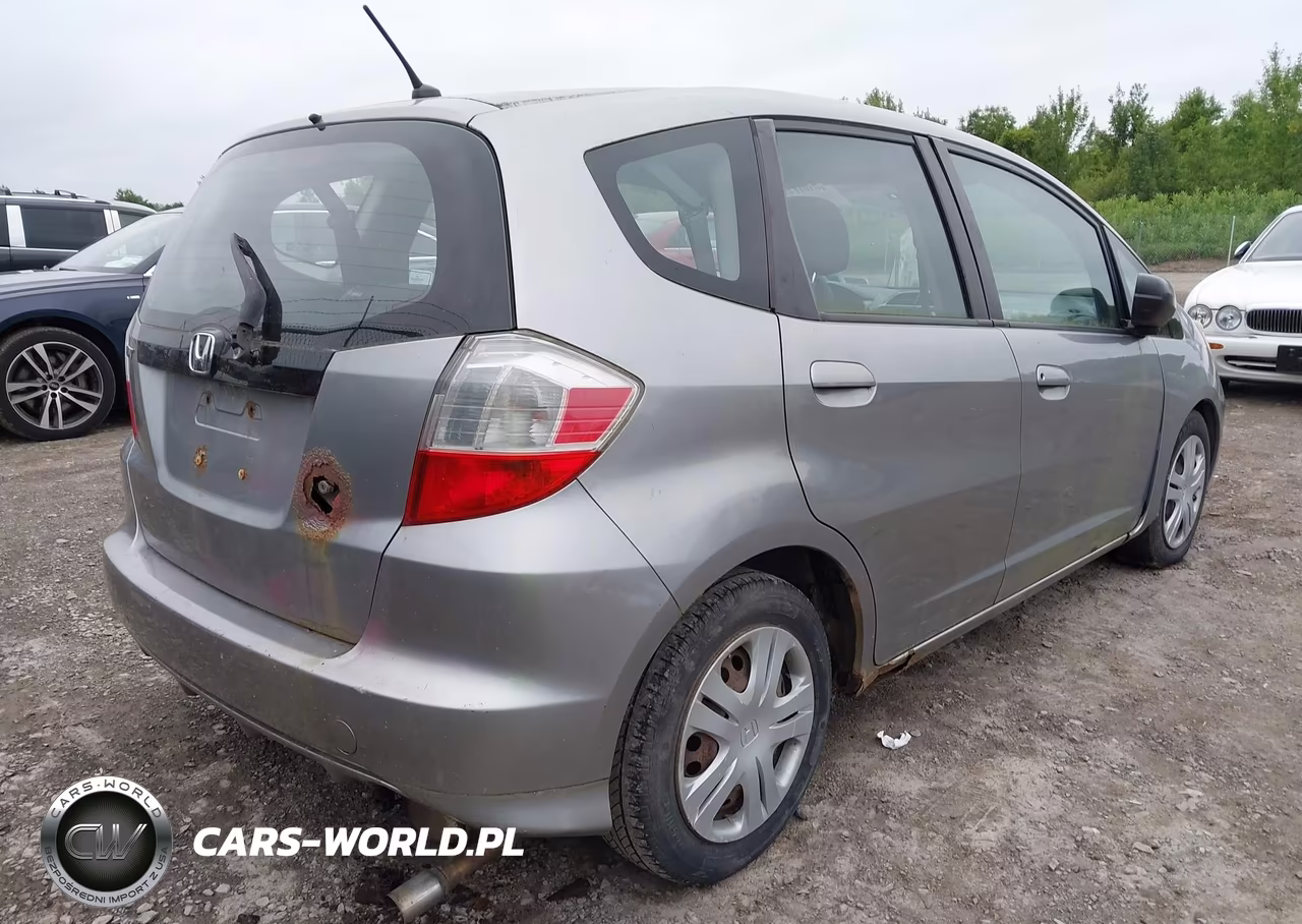 2009 Honda Fit VIN:JHMGE88299S015651 - 4