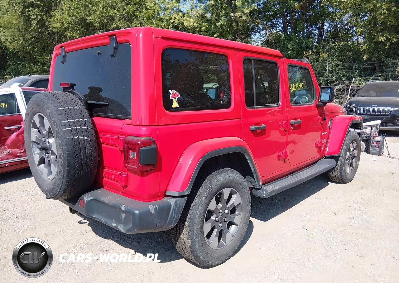 2019 Jeep Wrangler Unlimited Sahara 4X4 VIN:1C4HJXEN0KW683332 - 4