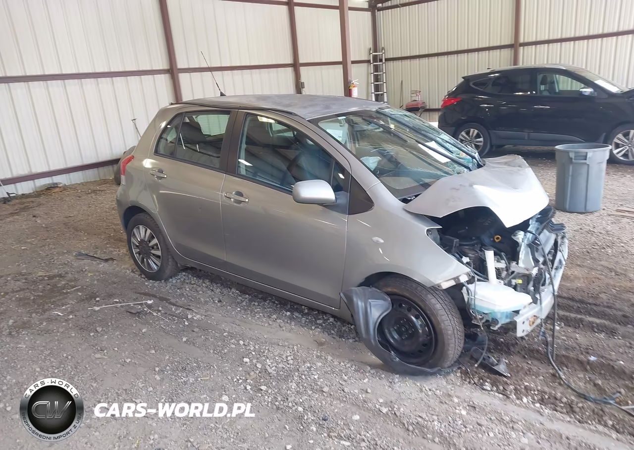2009 Toyota Yaris VIN:JTDKT903495258312 - 1