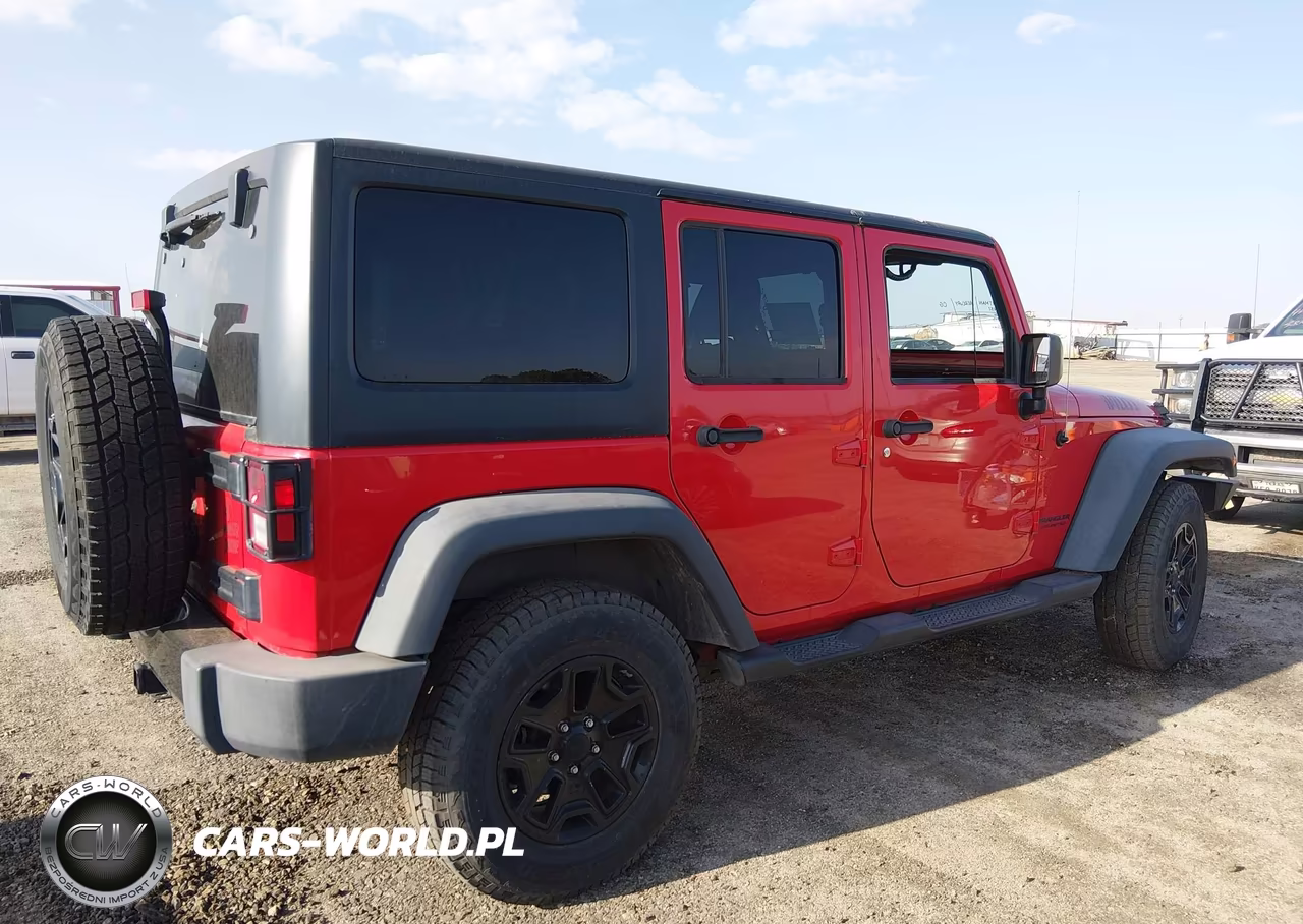 2016 Jeep Wrangler Unlimited Willys Wheeler VIN:1C4BJWDG1GL159263 - 4