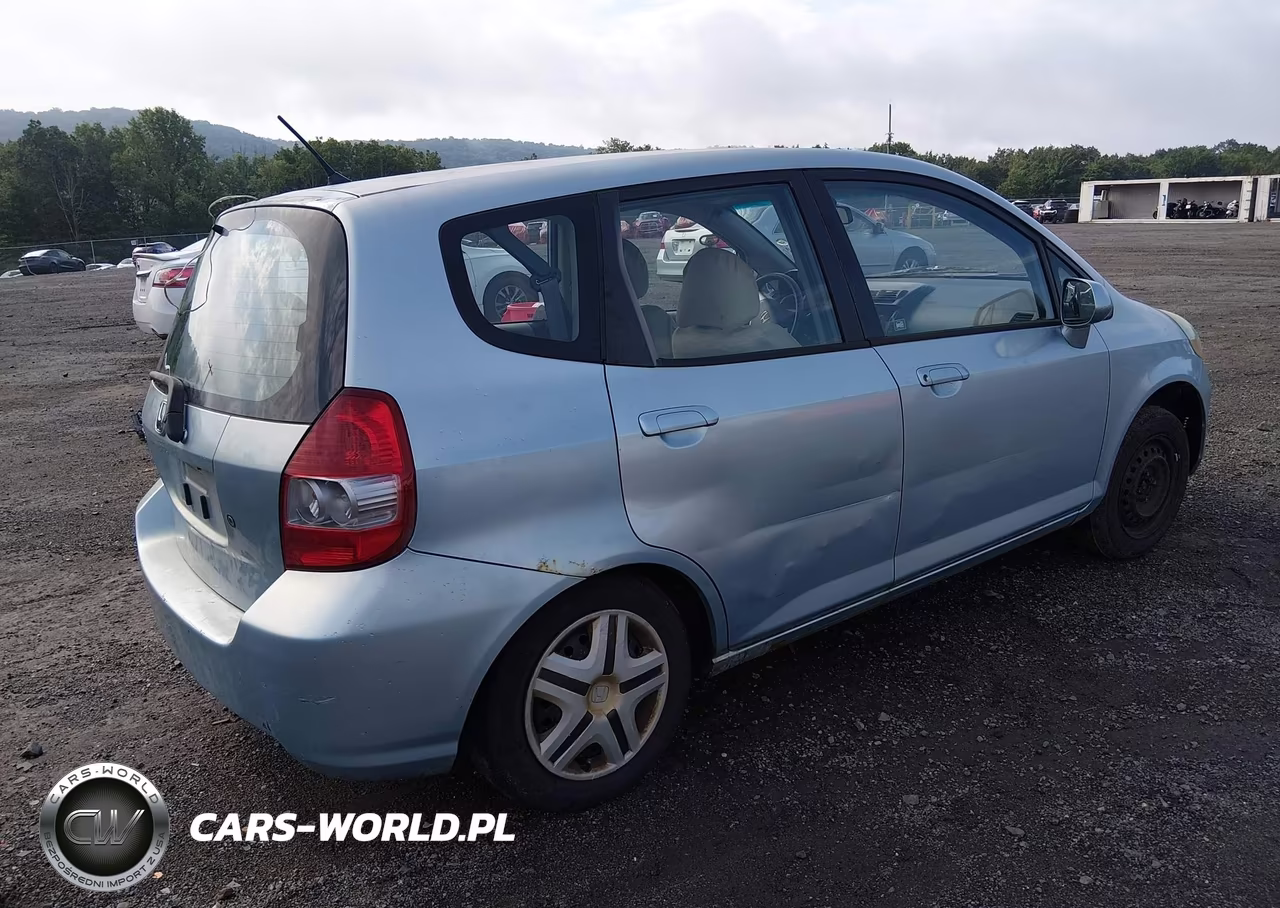 2007 Honda Fit VIN:JHMGD38497S024337 - 4