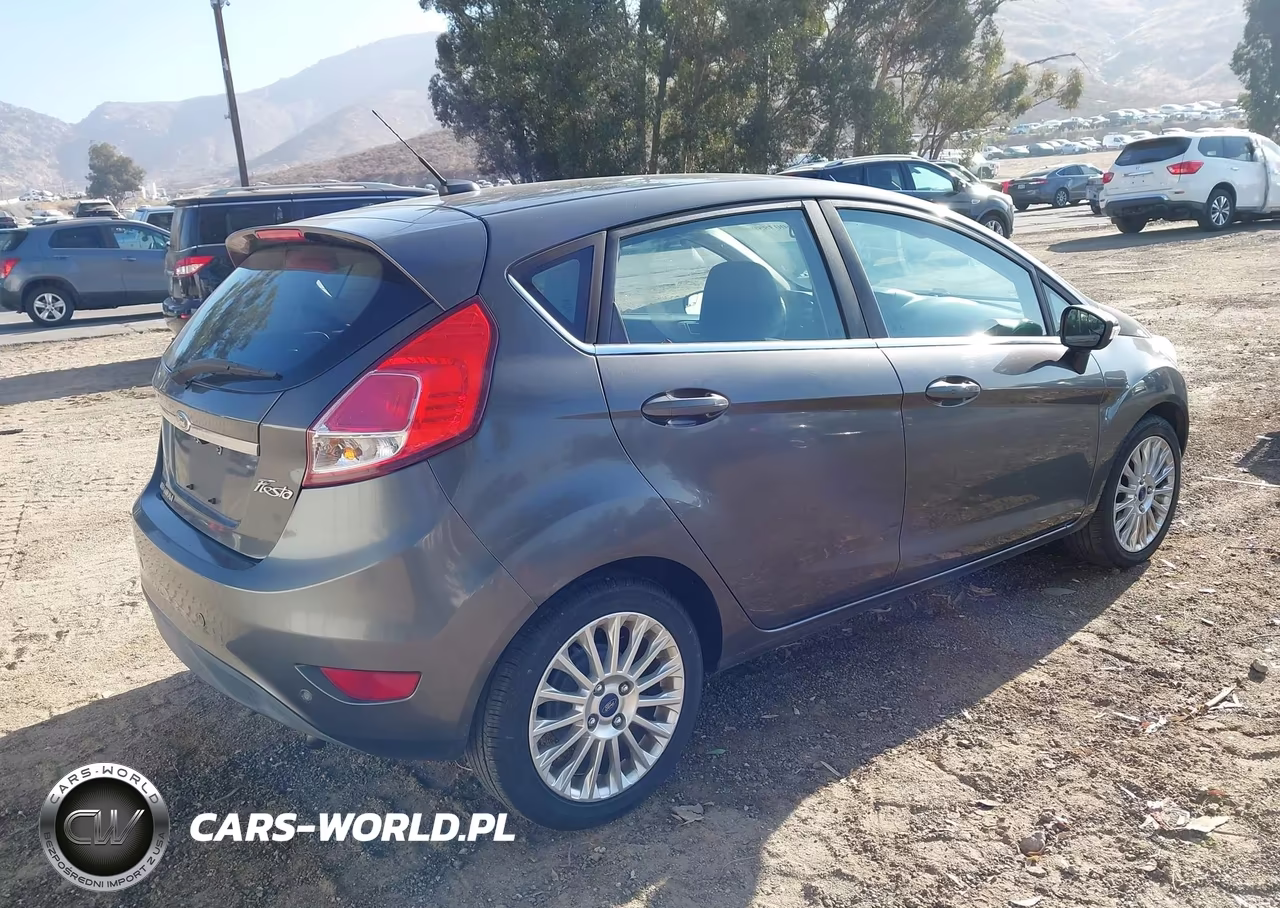 2015 Ford Fiesta Titanium VIN:3FADP4FJ9FM213206 - 4
