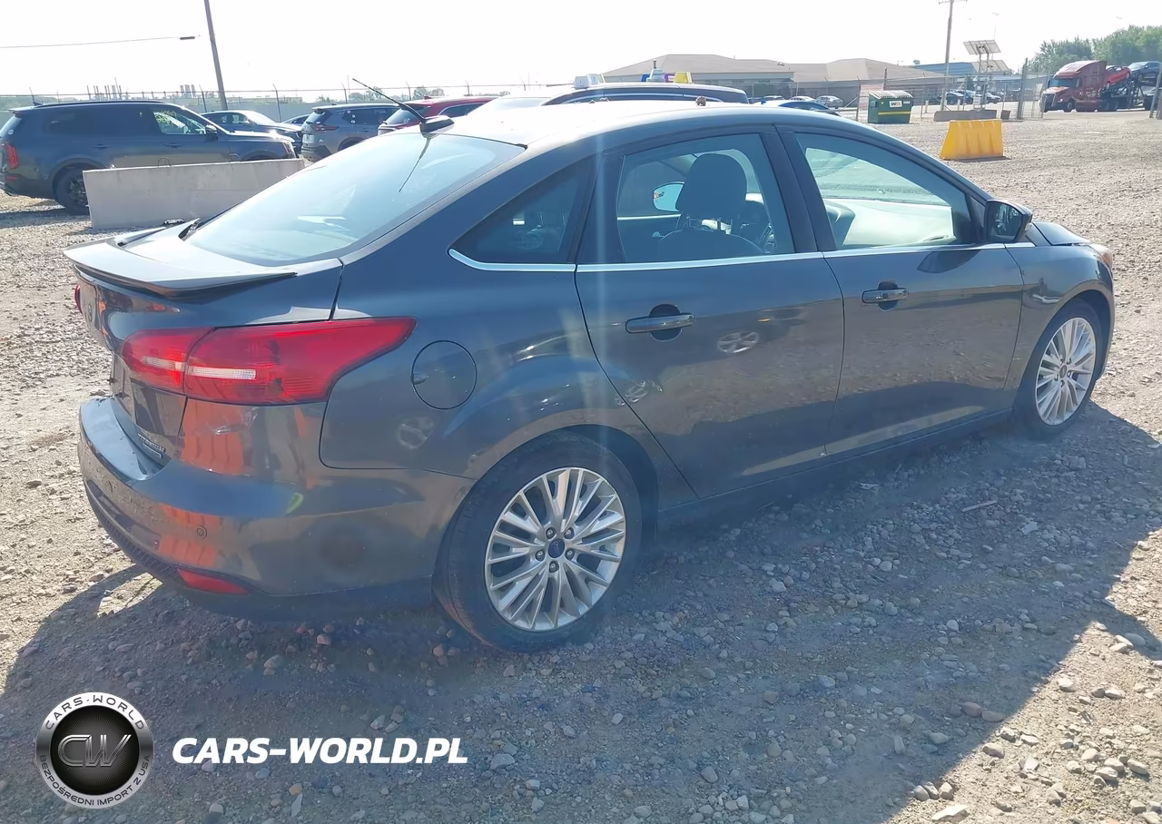 2016 Ford Focus Titanium VIN:1FADP3J25GL347529 - 4