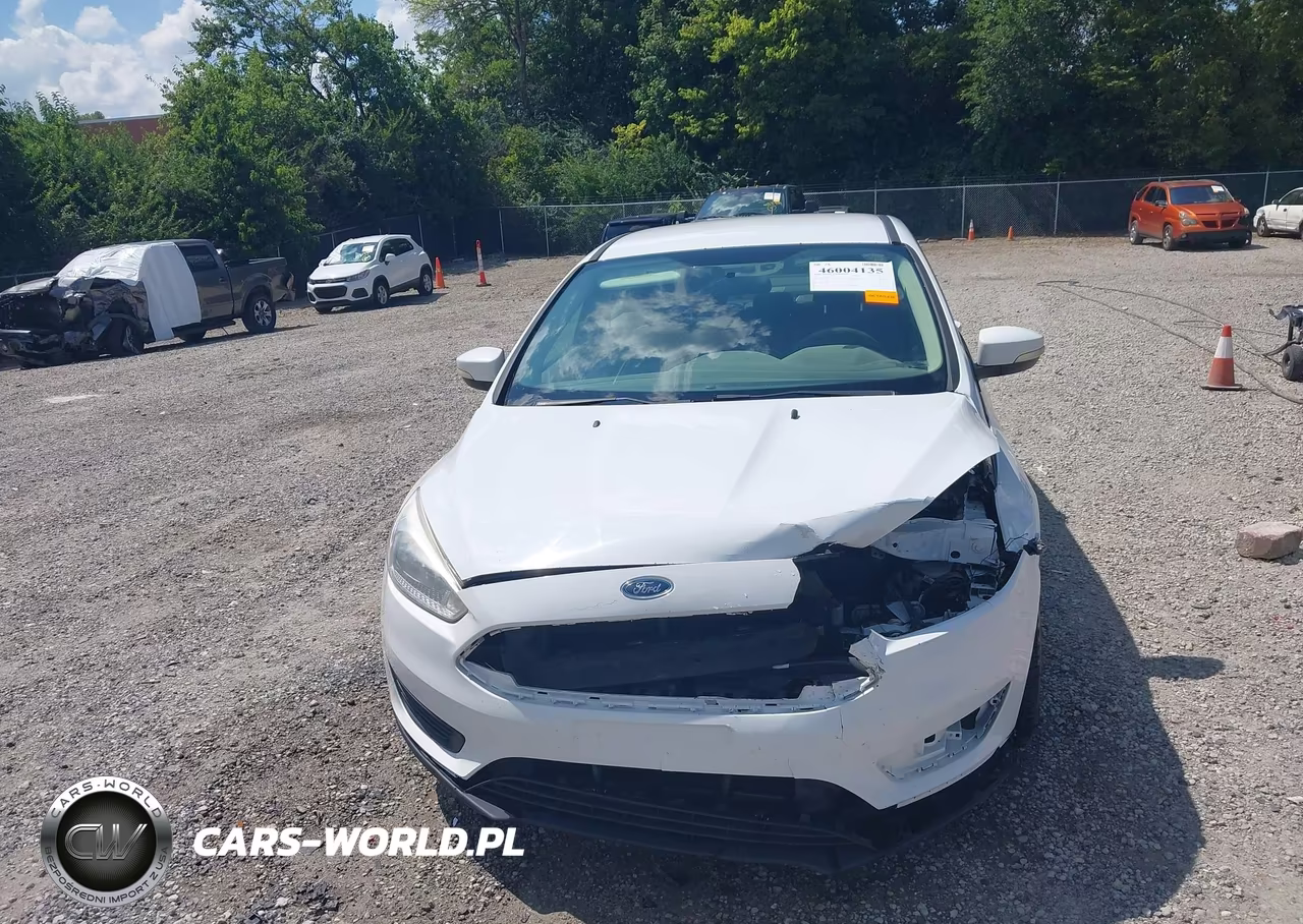 2017 Ford Focus Se VIN:1FADP3F24HL300020 - 12