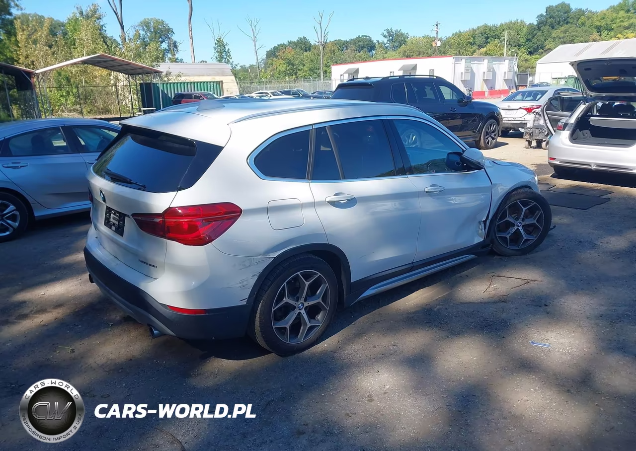 2018 BMW X1 xDrive28I VIN:WBXHT3C31J5L27077 - 4
