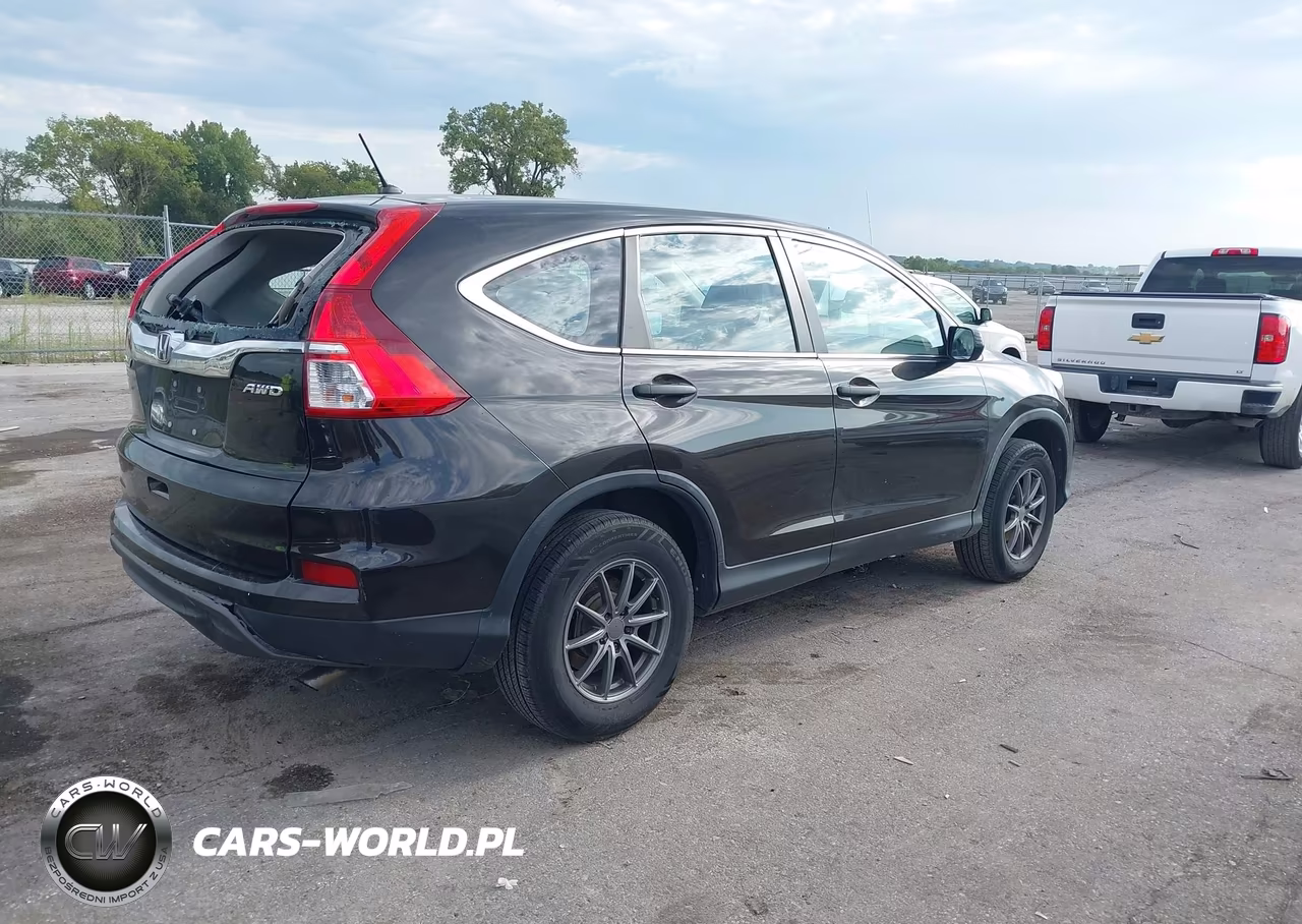 2015 Honda Cr-V Lx VIN:5J6RM4H32FL110065 - 4