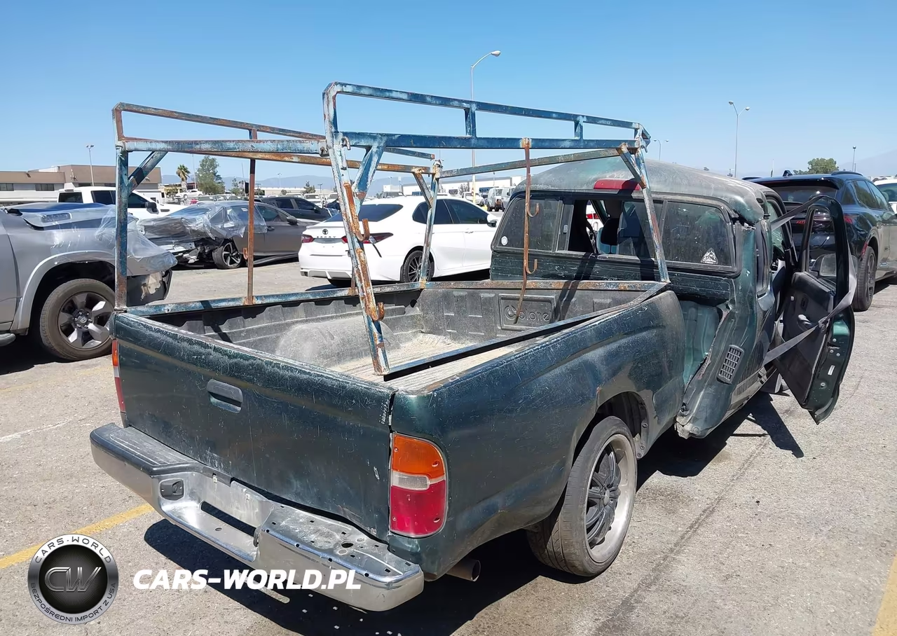 1999 Toyota Tacoma Base V6 VIN:4TAVN52N8XZ518453 - 4