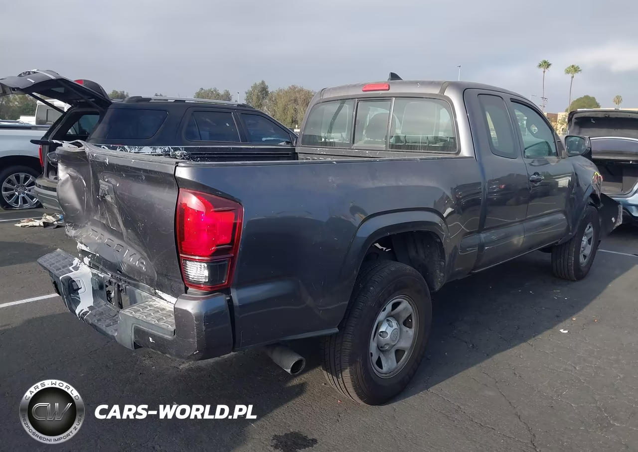 2018 Toyota Tacoma Sr VIN:5TFRX5GN4JX109961 - 4