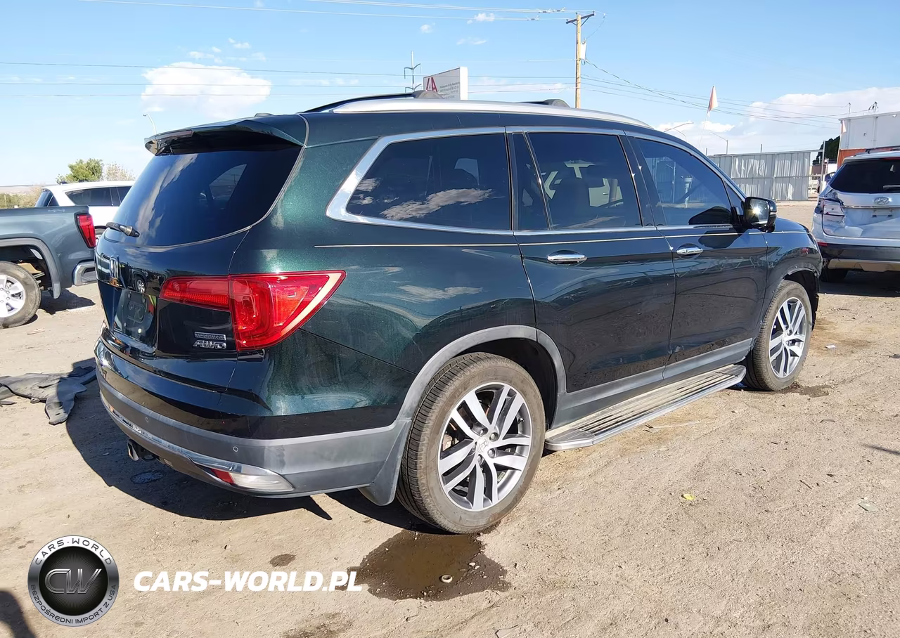 2016 Honda Pilot Touring VIN:5FNYF6H93GB109409 - 4