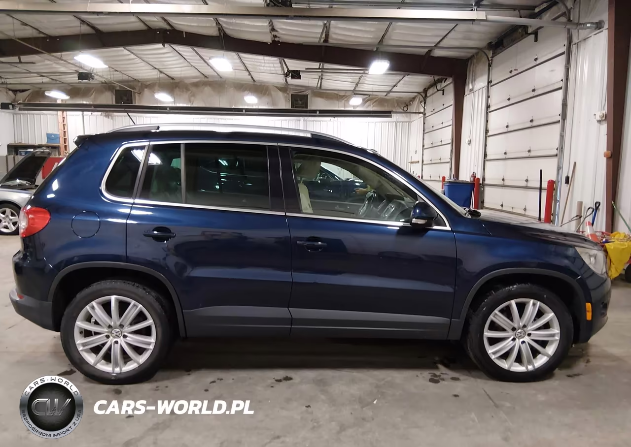 2011 Volkswagen Tiguan Sel VIN:WVGBV7AX0BW520306 - 13