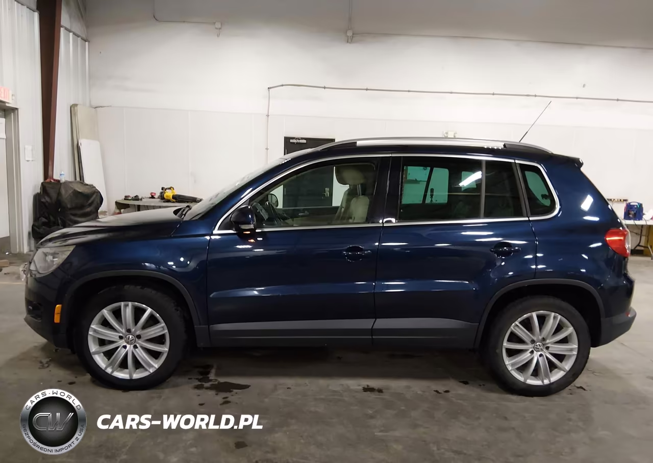 2011 Volkswagen Tiguan Sel VIN:WVGBV7AX0BW520306 - 14