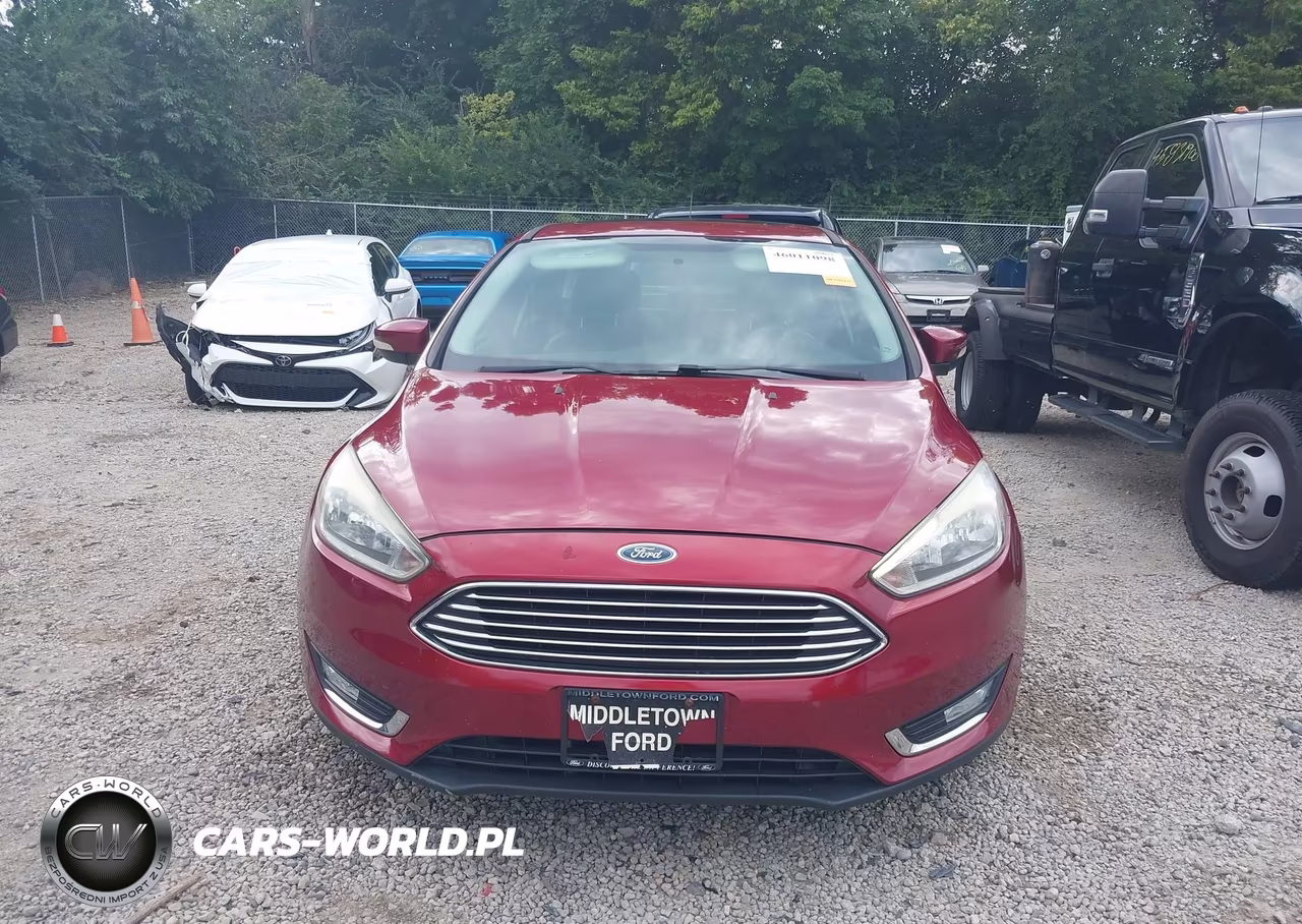 2016 Ford Focus Titanium VIN:1FADP3N29GL257617 - 12