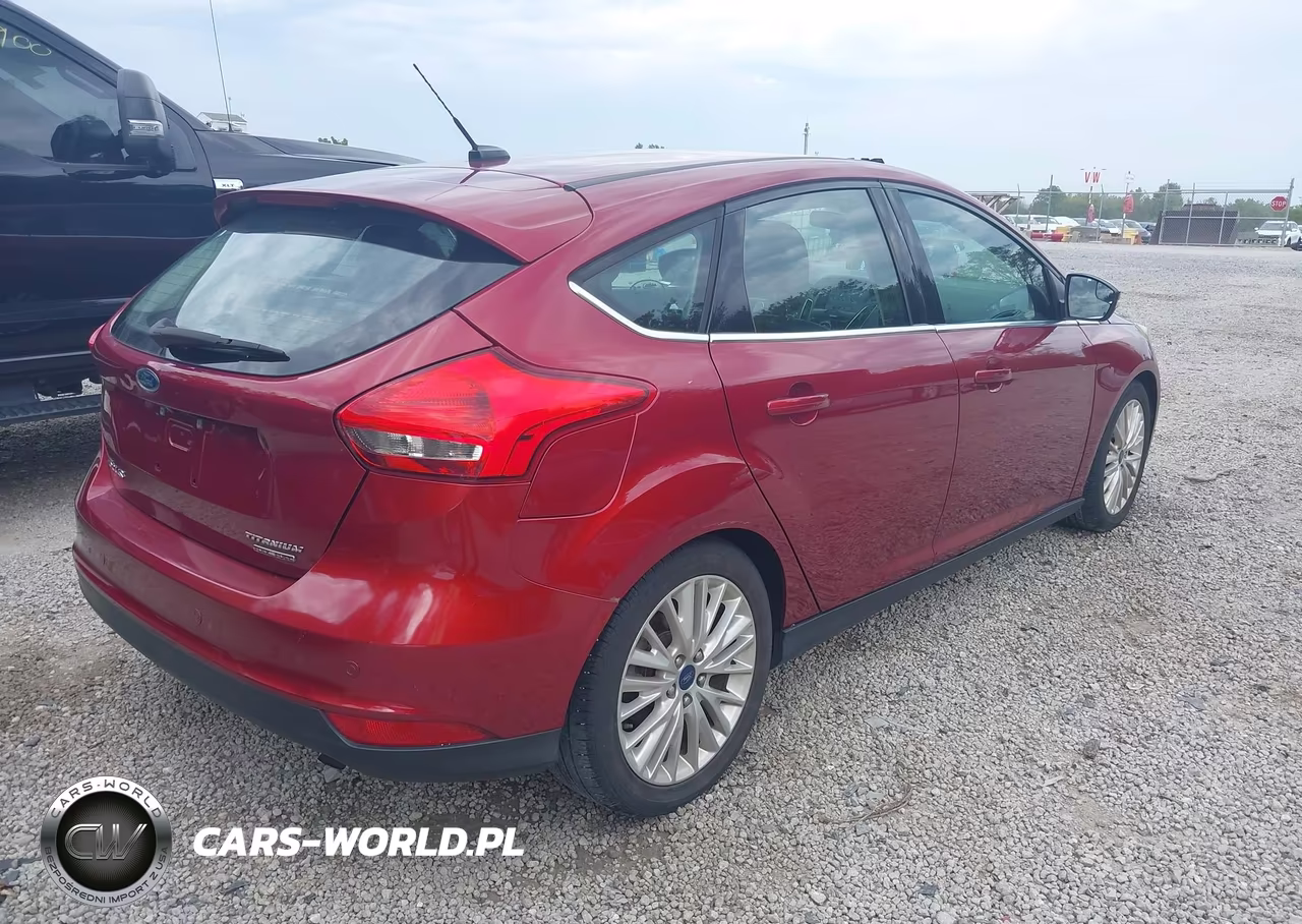 2016 Ford Focus Titanium VIN:1FADP3N29GL257617 - 4