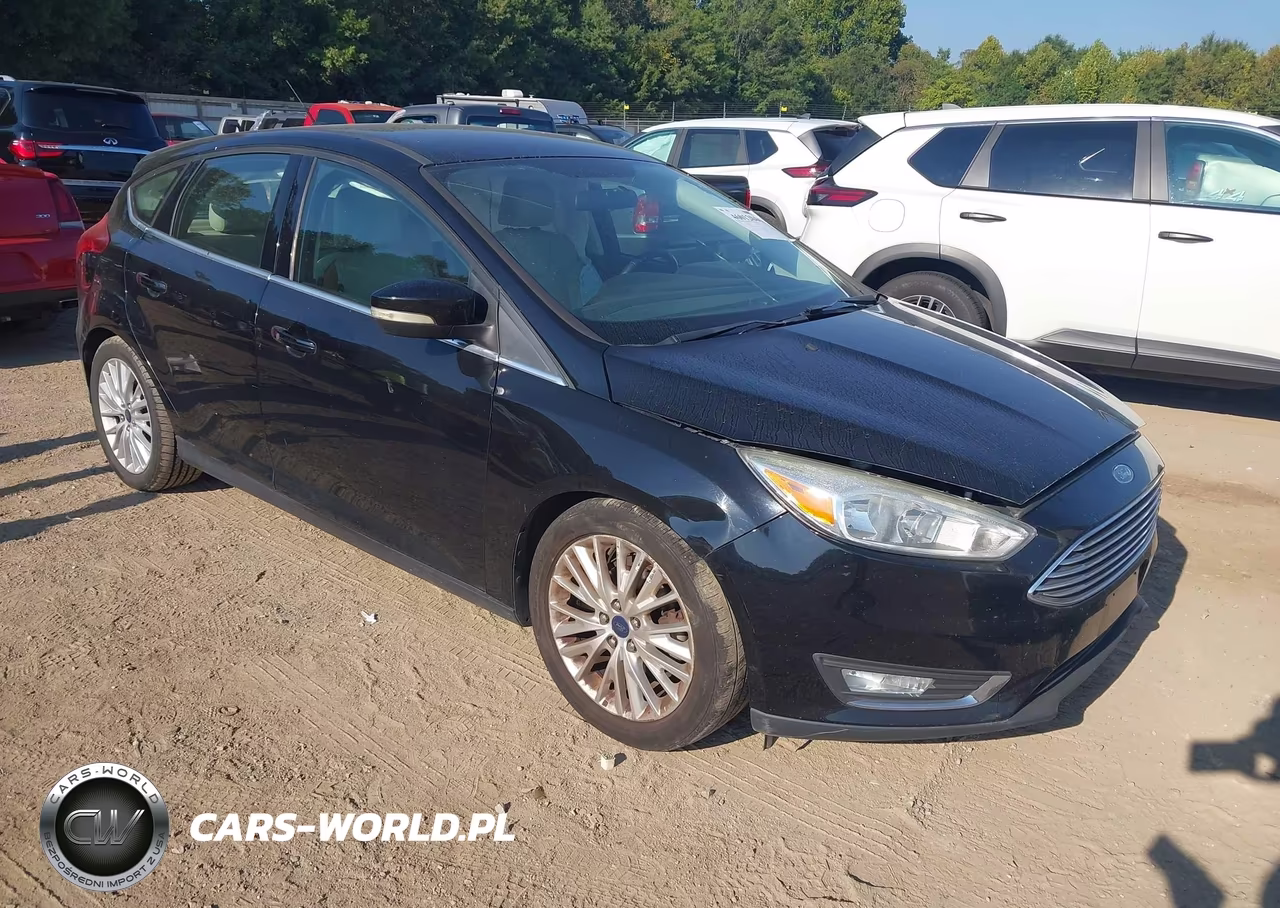 2016 Ford Focus Titanium VIN:1FADP3N26GL235445 - 1