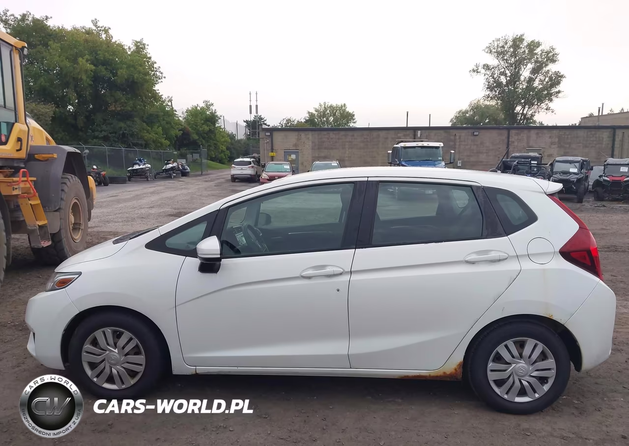 2015 Honda Fit Lx VIN:3HGGK5G55FM727147 - 14