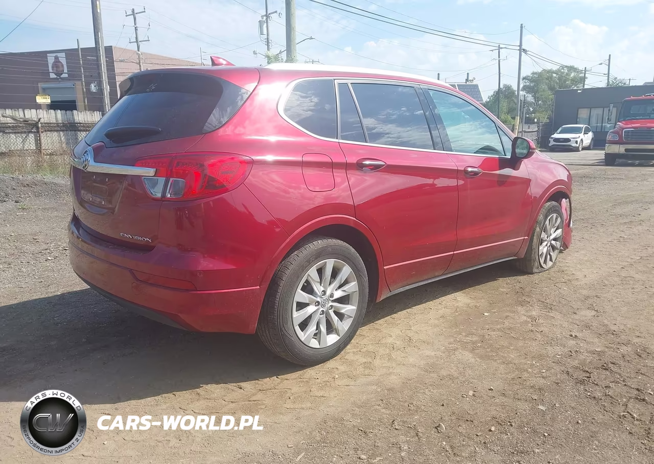 2018 Buick Envision Essence VIN:LRBFX1SAXJD023893 - 4