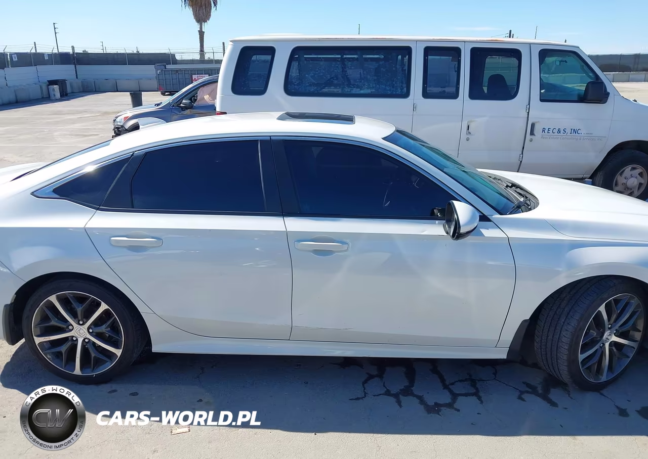 2023 Honda Civic Touring VIN:2HGFE1F91PH310303 - 14