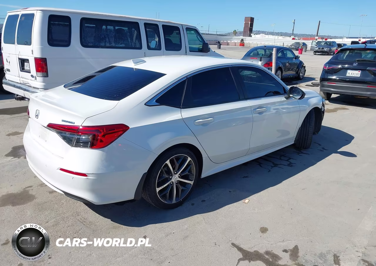 2023 Honda Civic Touring VIN:2HGFE1F91PH310303 - 4