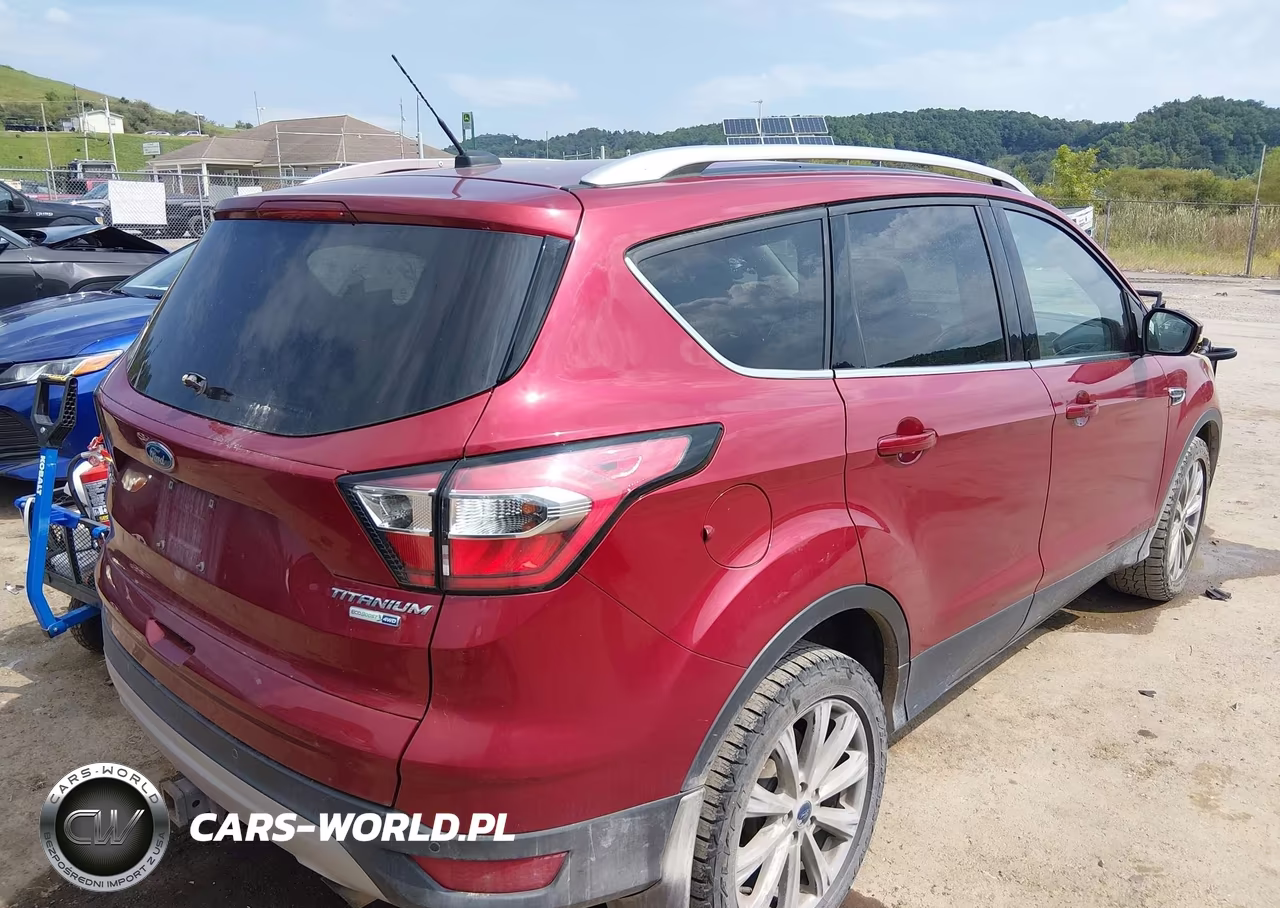 2017 Ford Escape Titanium VIN:1FMCU9J96HUC85791 - 4