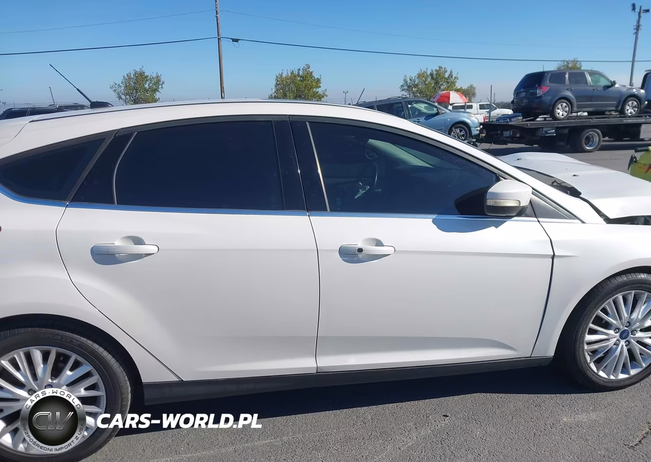 2015 Ford Focus Titanium VIN:1FADP3N20FL339556 - 13