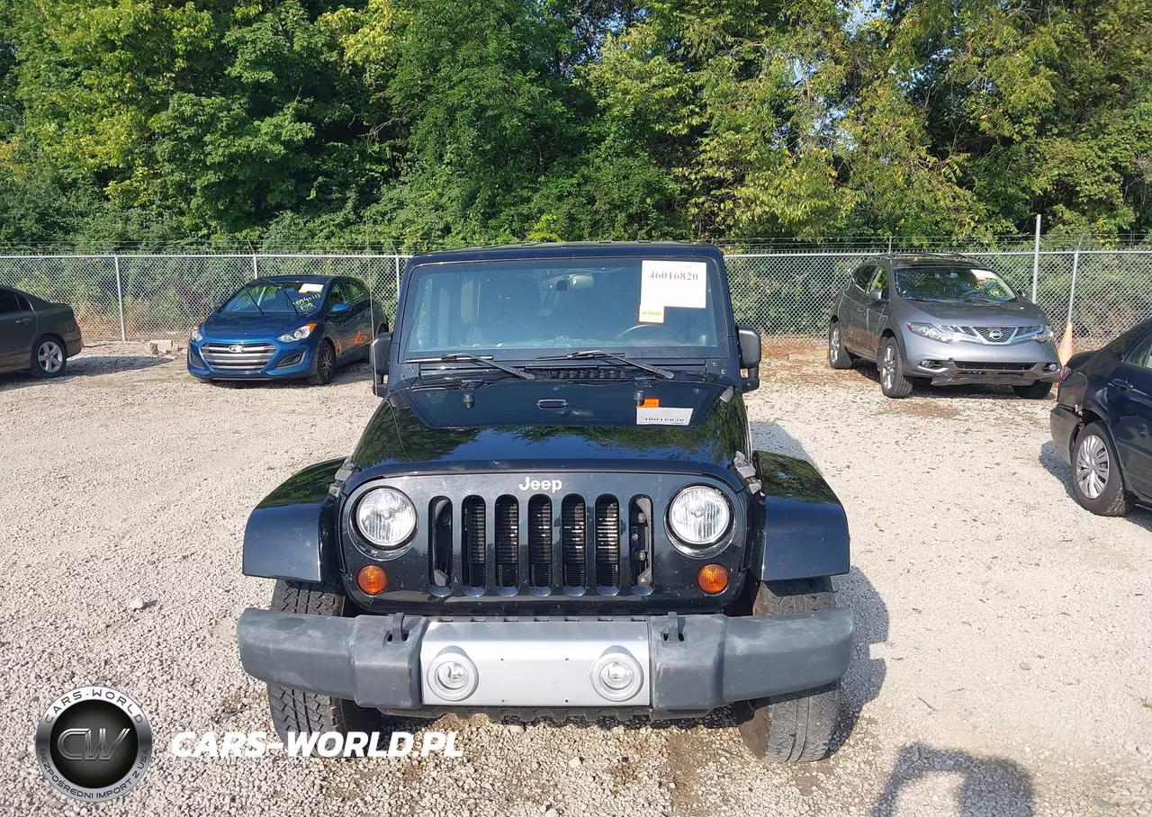 2012 Jeep Wrangler Unlimited Sahara VIN:1C4HJWEG6CL281667 - 12