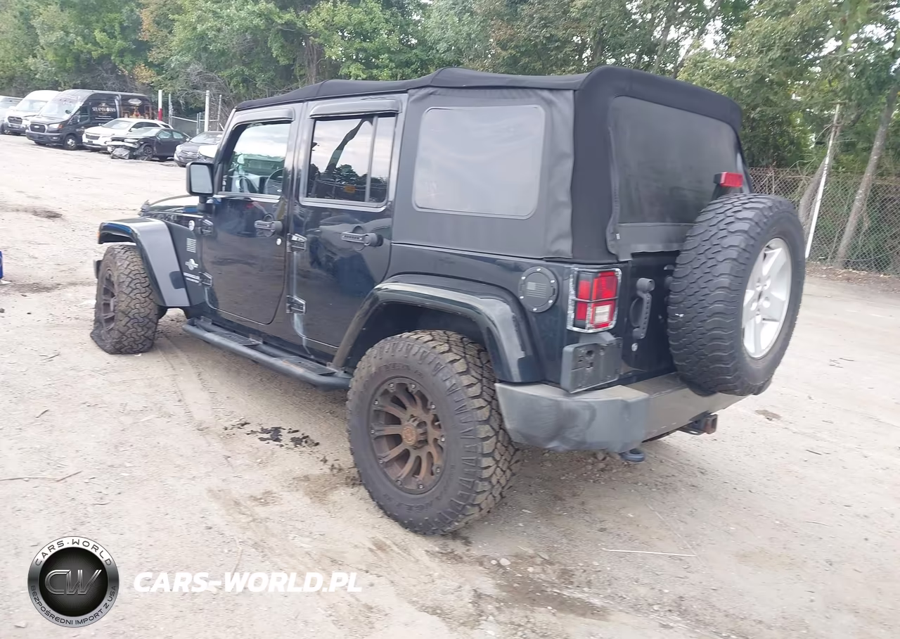 2014 Jeep Wrangler Unlimited Freedom Edition VIN:1C4BJWDG4EL184297 - 3